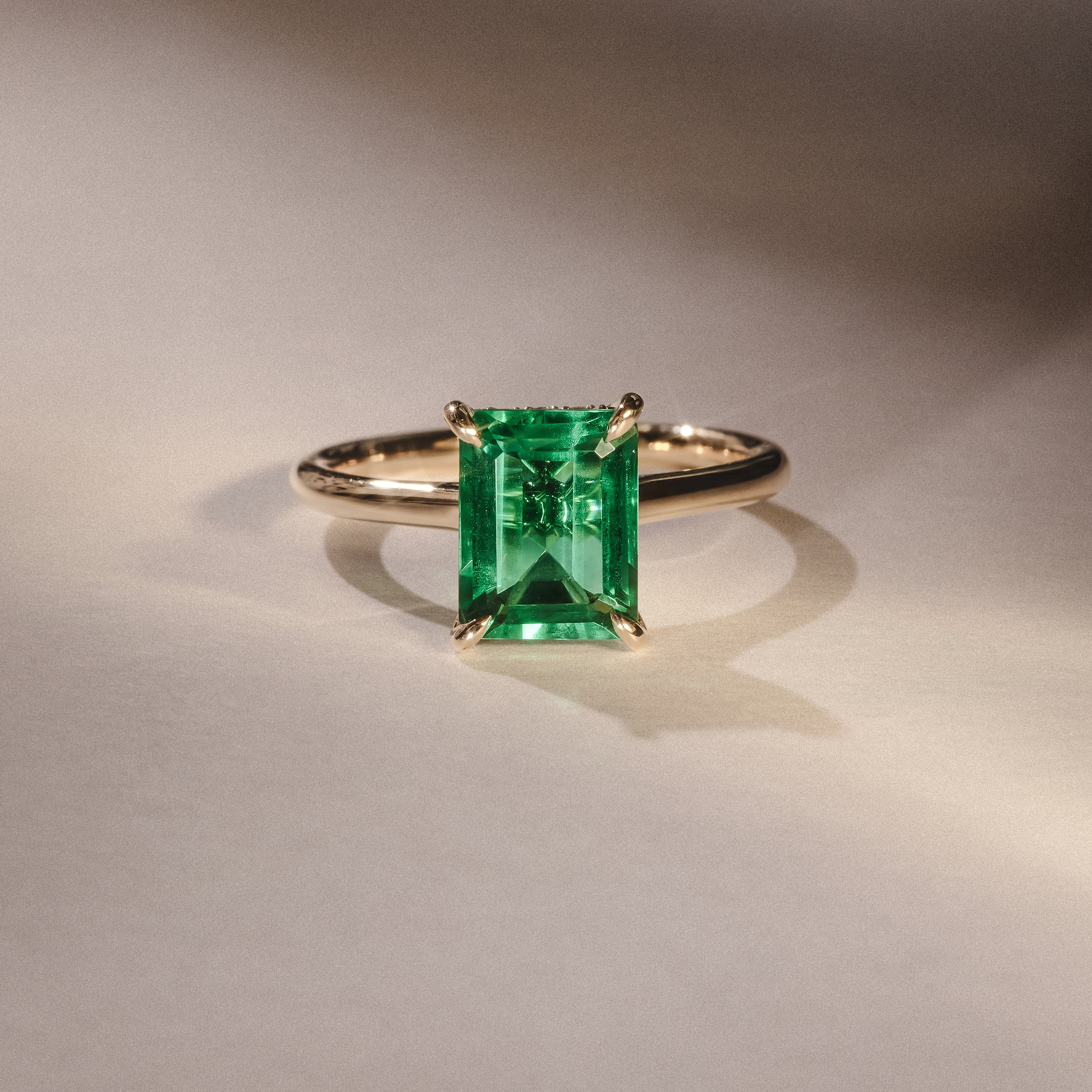 Amora 2.00ct Emerald Cut Lab Emerald Hidden Halo Engagement Ring in 18K Yellow Gold - Image 6