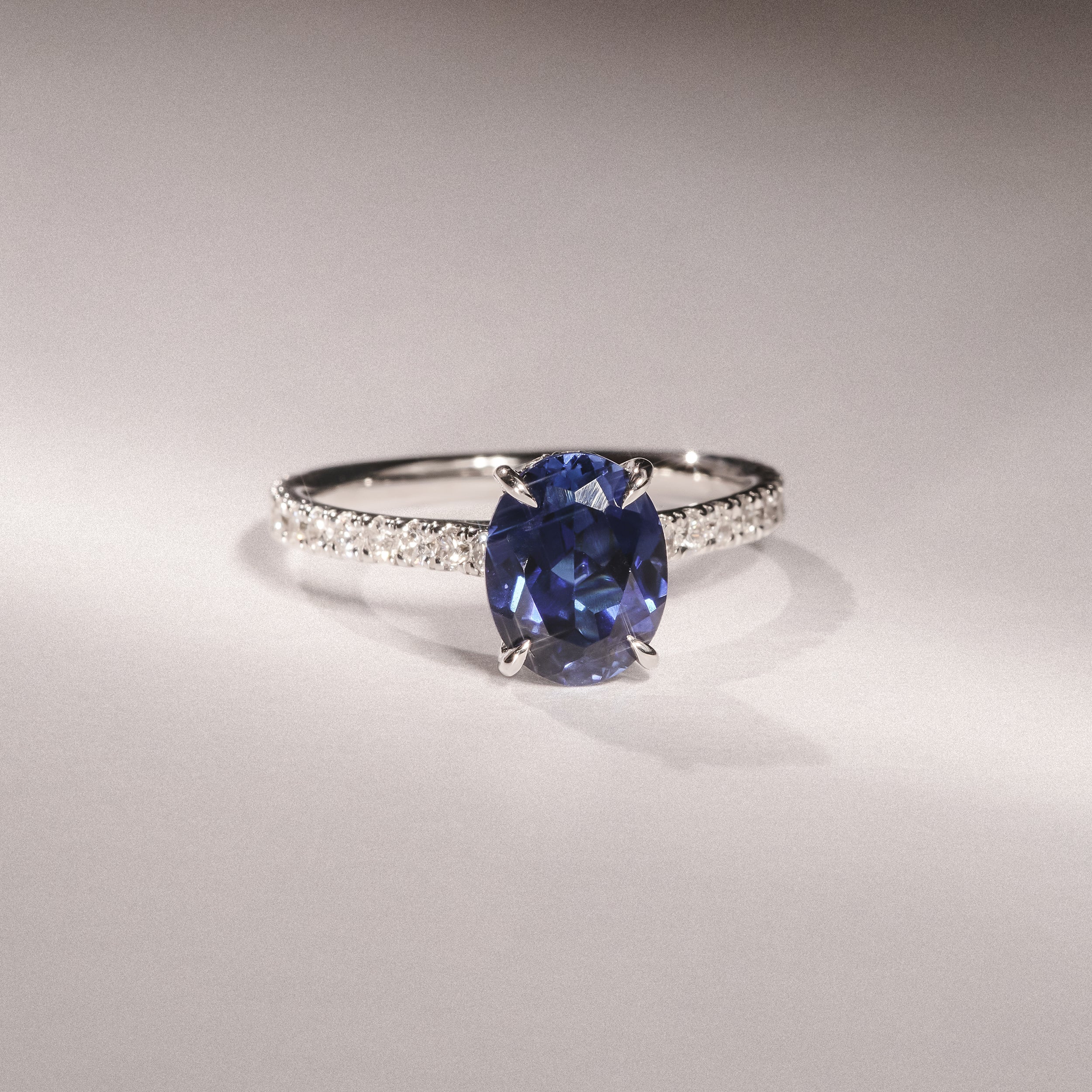 Amora 2.00ct Oval Cut Lab Sapphire Hidden Halo Engagement Ring with Side Stones in 18K White Gold - Image 6