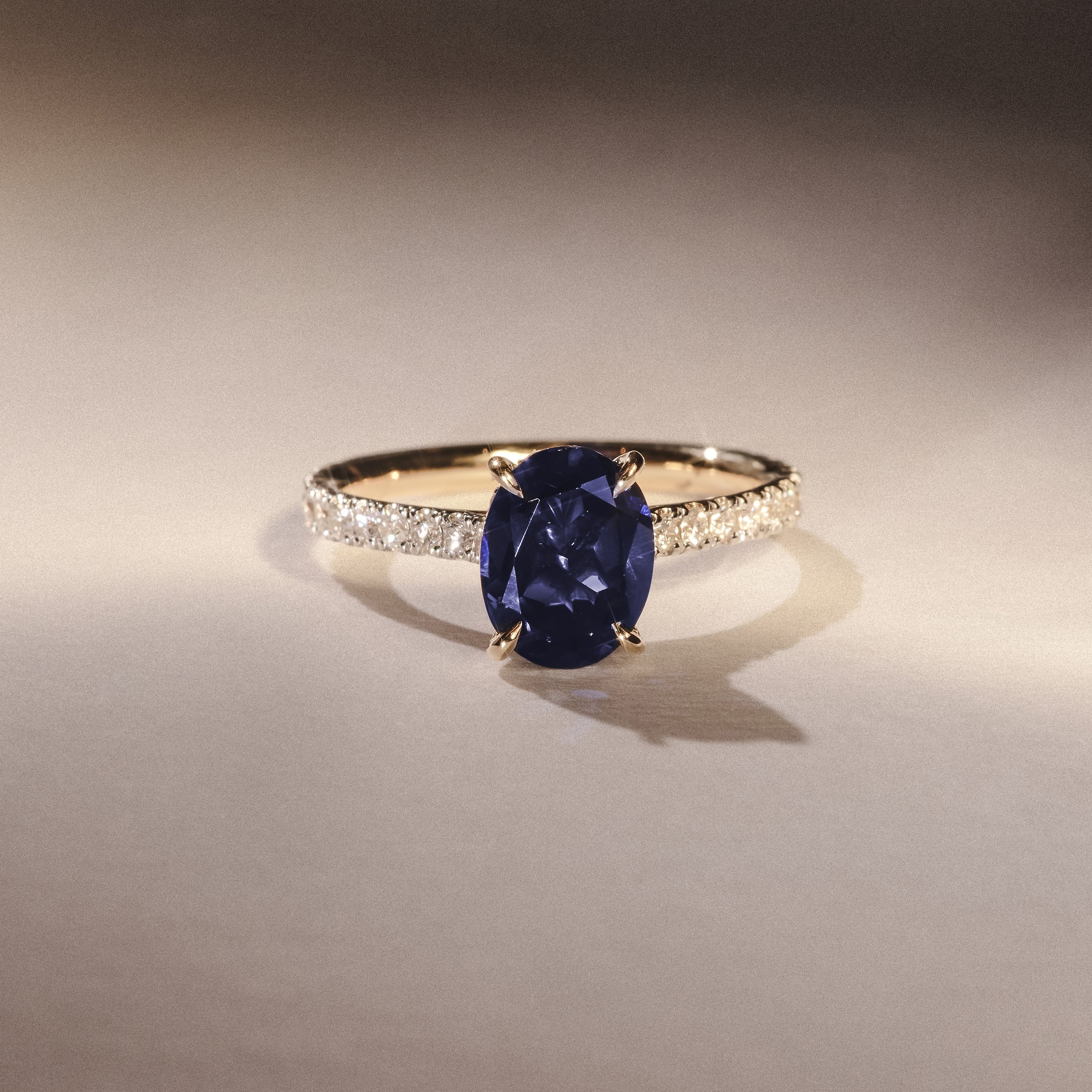 Amora 2.00ct Oval Cut Lab Sapphire Hidden Halo Engagement Ring with Side Stones in 18K Yellow Gold - Image 6