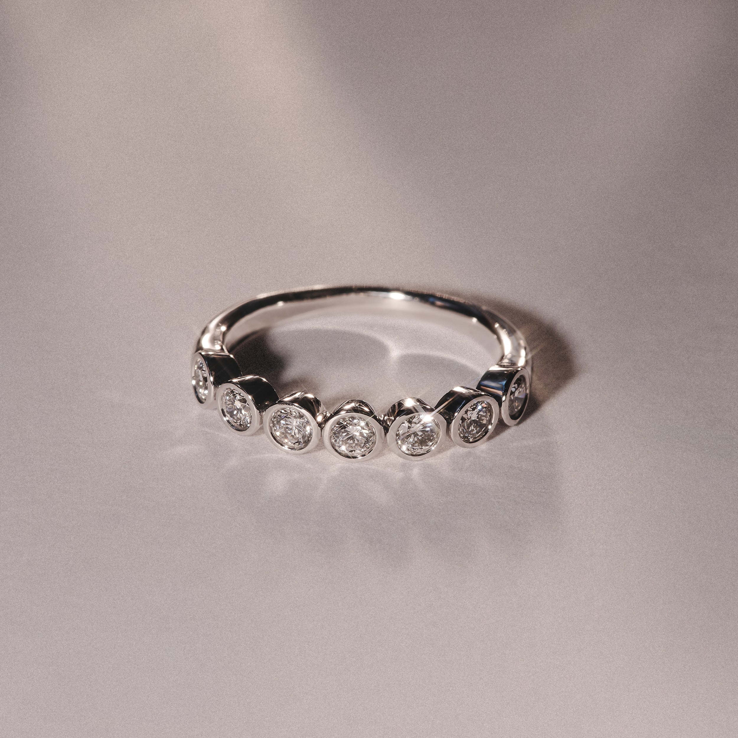 Orbit Half Band 0.50ct F/VS Round Cut Rubover Eternity Ring in 9K White Gold - Image 6