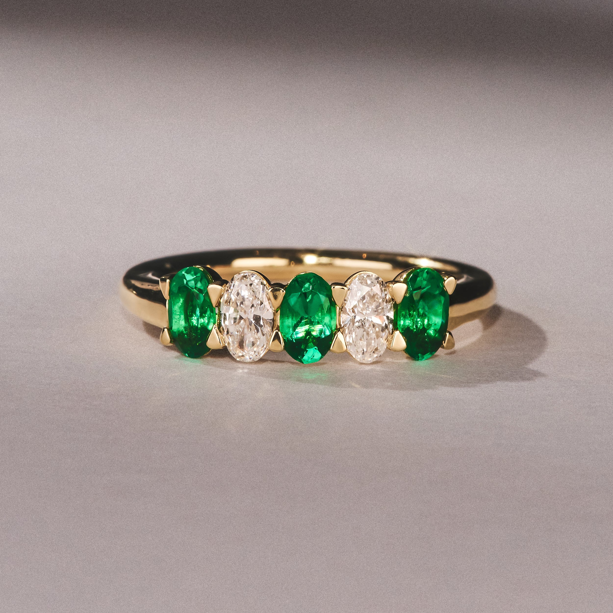 Solene 0.75ct Oval Cut Lab Emerald and Lab Diamond Half Band Eternity Ring in 18K Yellow Gold - Image 4