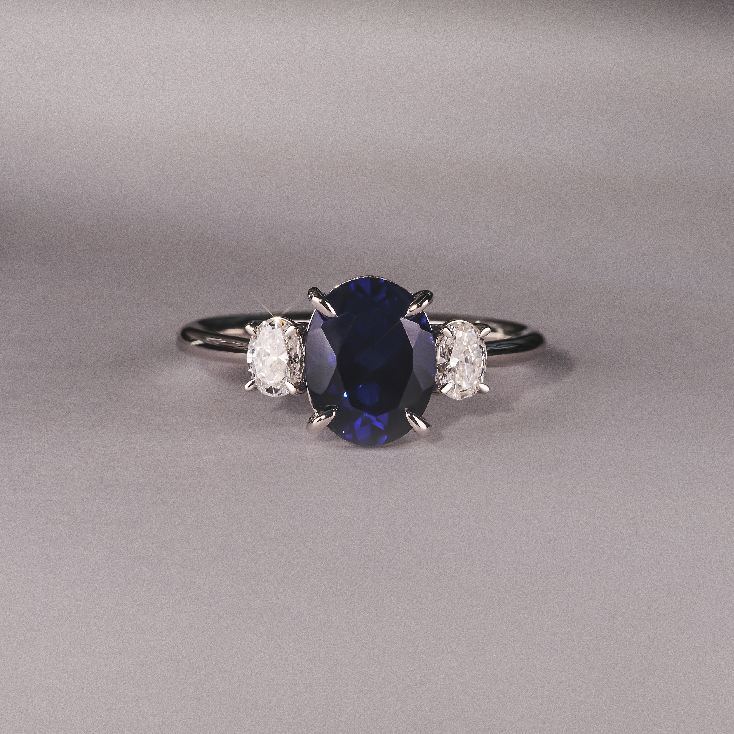Solene 2.00ct Oval Cut Lab Sapphire and Lab Diamond 3 Stone Engament Ring in 18K White Gold - Image 6